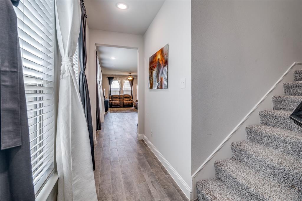 1069 Norias Drive Forney, TX 75126 - Photo 6 of 36 a view of a hallway view with staircase