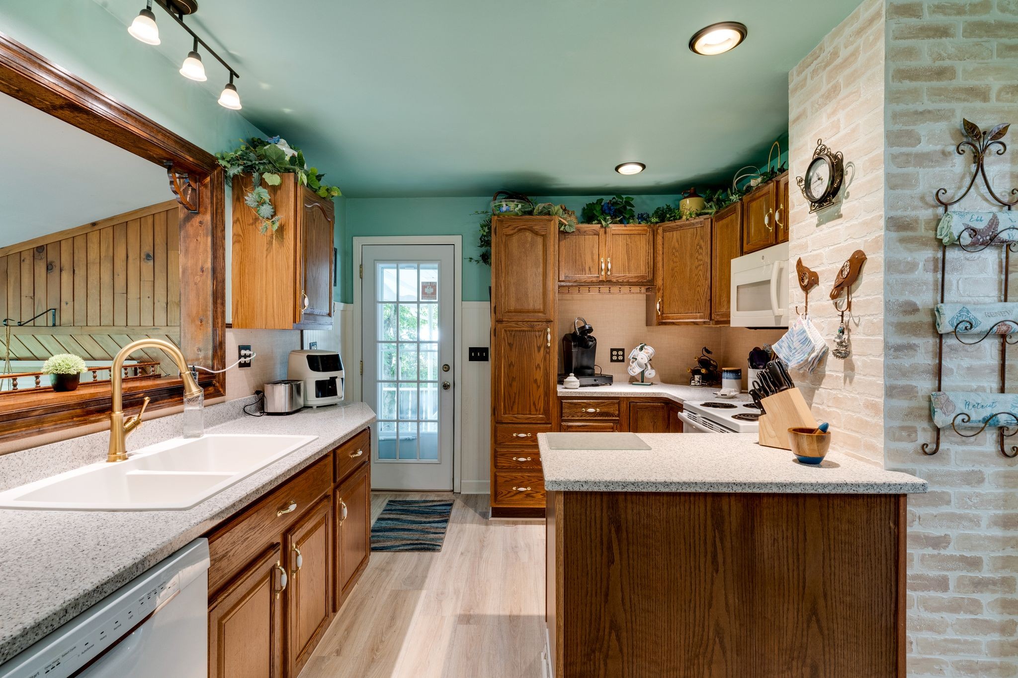 104 Shelby Street Old Hickory, TN 37138 - Photo 12 of 29 a kitchen with stainless steel appliances a sink stove and refrigerator