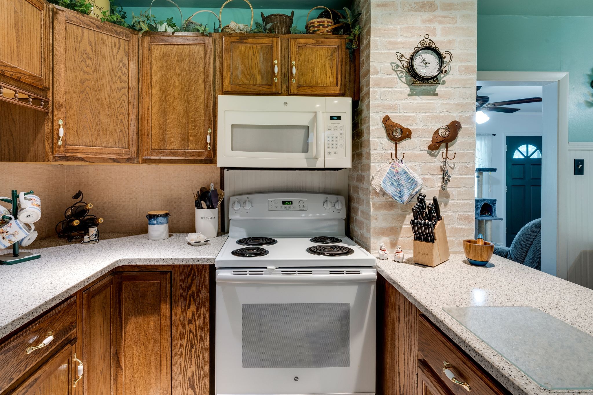 104 Shelby Street Old Hickory, TN 37138 - Photo 13 of 29 a kitchen with stainless steel appliances a stove a sink a refrigerator and cabinets