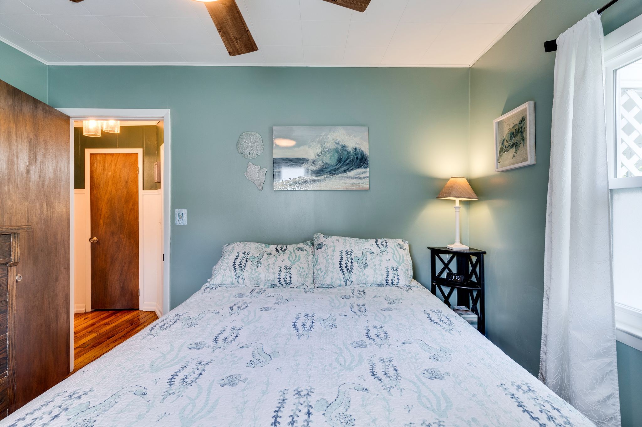 104 Shelby Street Old Hickory, TN 37138 - Photo 22 of 29 a bedroom with a bed and a painting on the wall