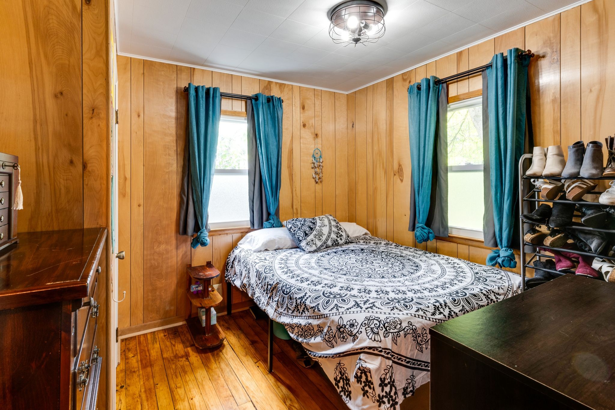 104 Shelby Street Old Hickory, TN 37138 - Photo 24 of 29 a bedroom with a bed and a dresser next to a window