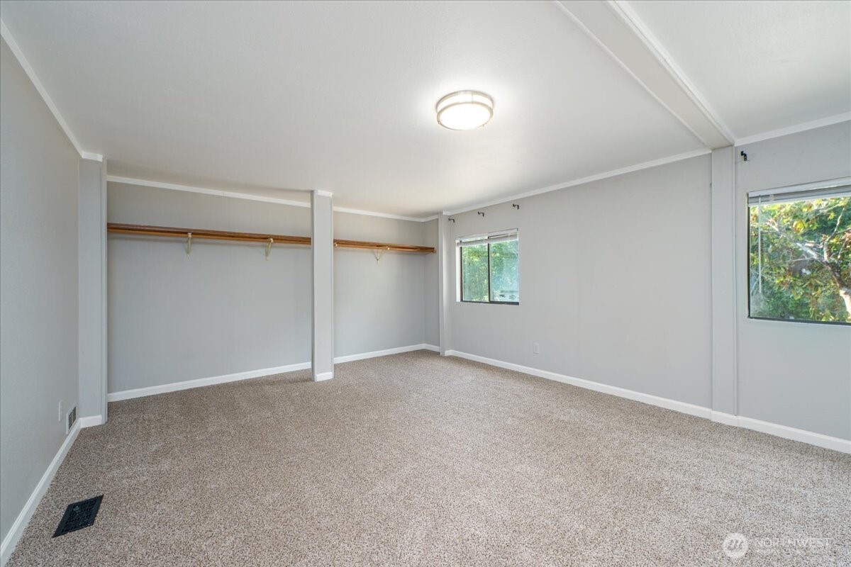 331 Frontier Road Grapeview, WA 98546 - Photo 23 of 39 an empty room with windows