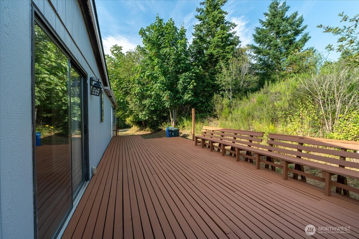 331 Frontier Road Grapeview, WA 98546 - Photo 28 of 39 a view of a deck yard from a balcony