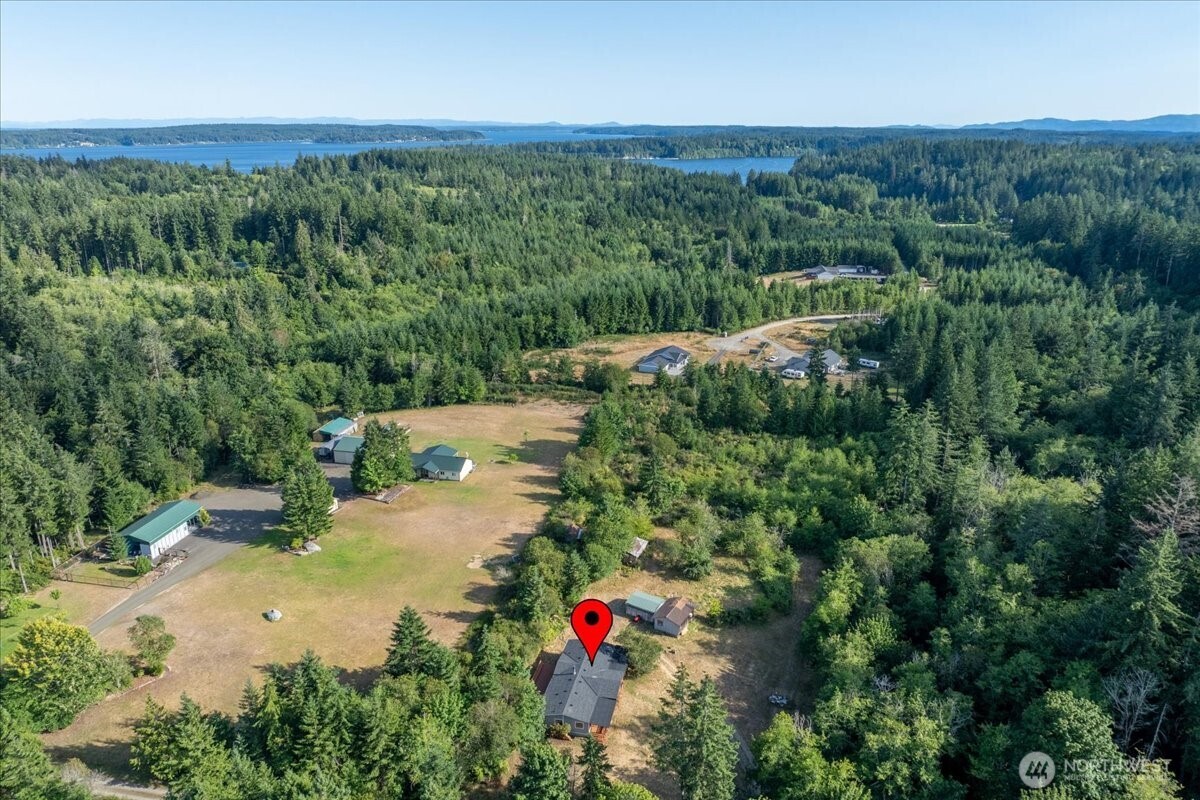 331 Frontier Road Grapeview, WA 98546 - Photo 39 of 39 an aerial view of residential houses with outdoor space and trees