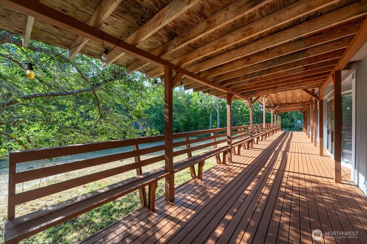 331 Frontier Road Grapeview, WA 98546 - Photo 5 of 39 a view of two chairs in the balcony