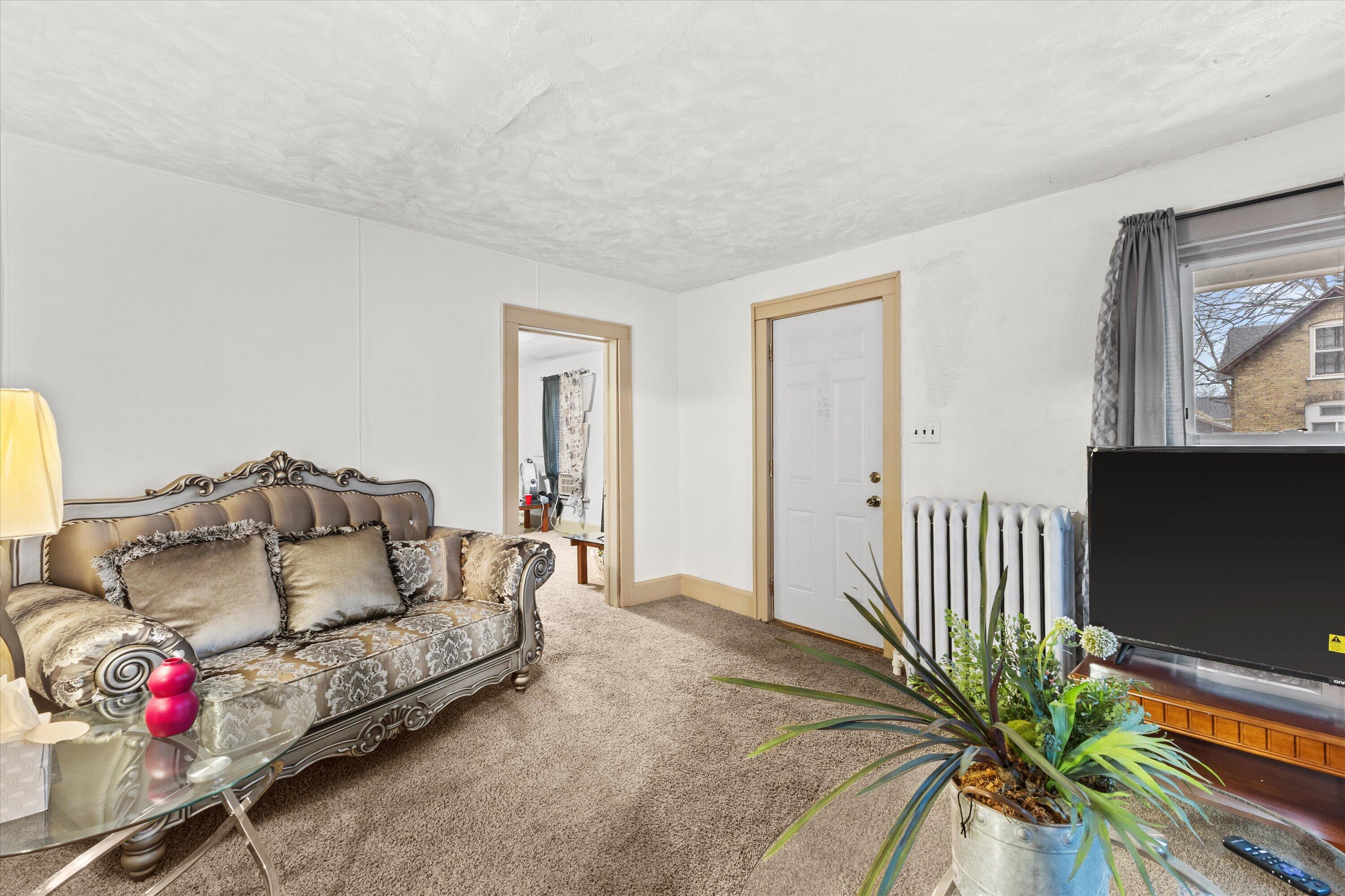 1718 Erie Street Racine, WI 53402 - Photo 5 of 15 Lower Living Room