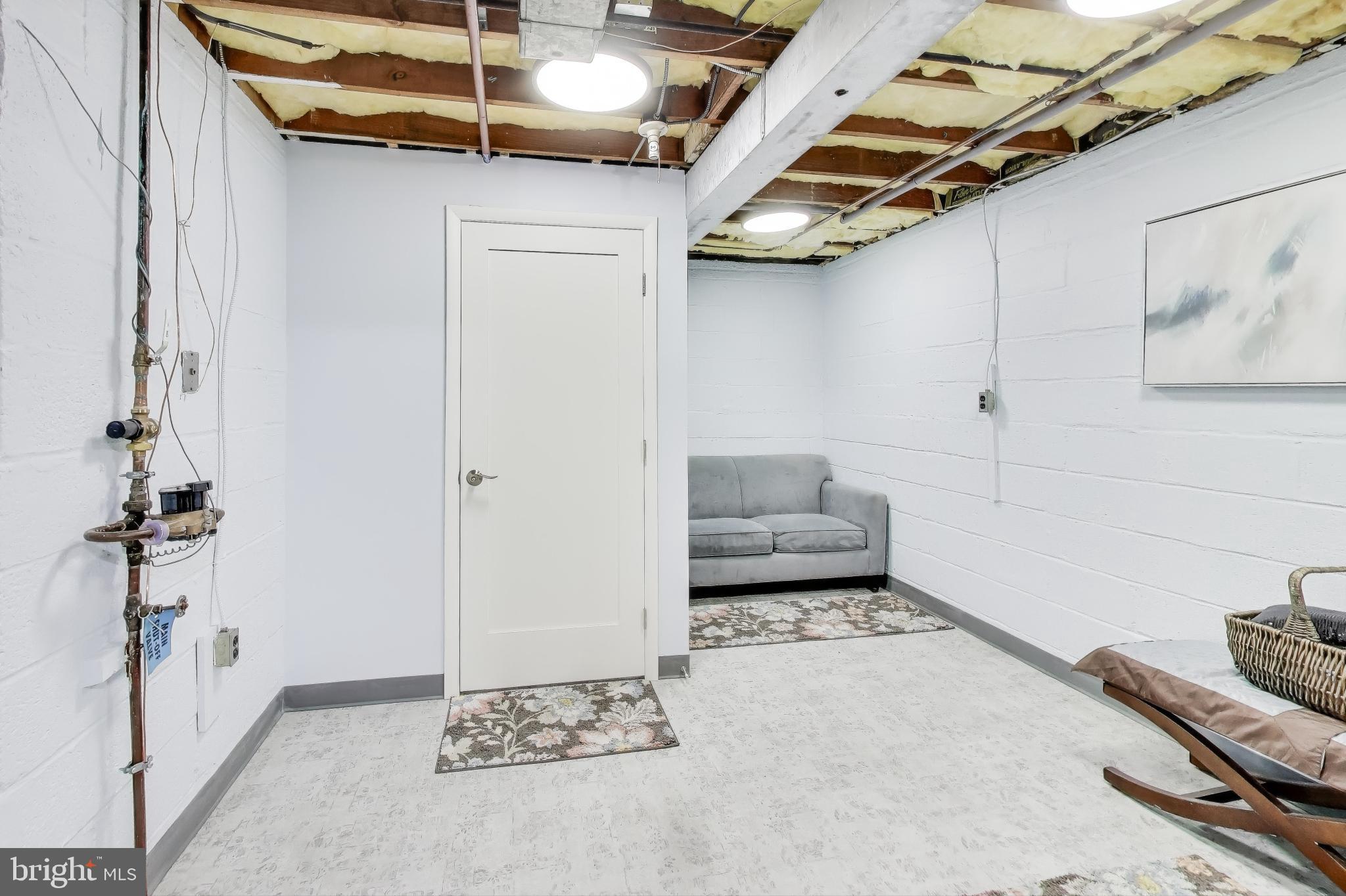 9613 Lorain Avenue Silver Spring, MD 20901 - Photo 29 of 40 a living room with furniture