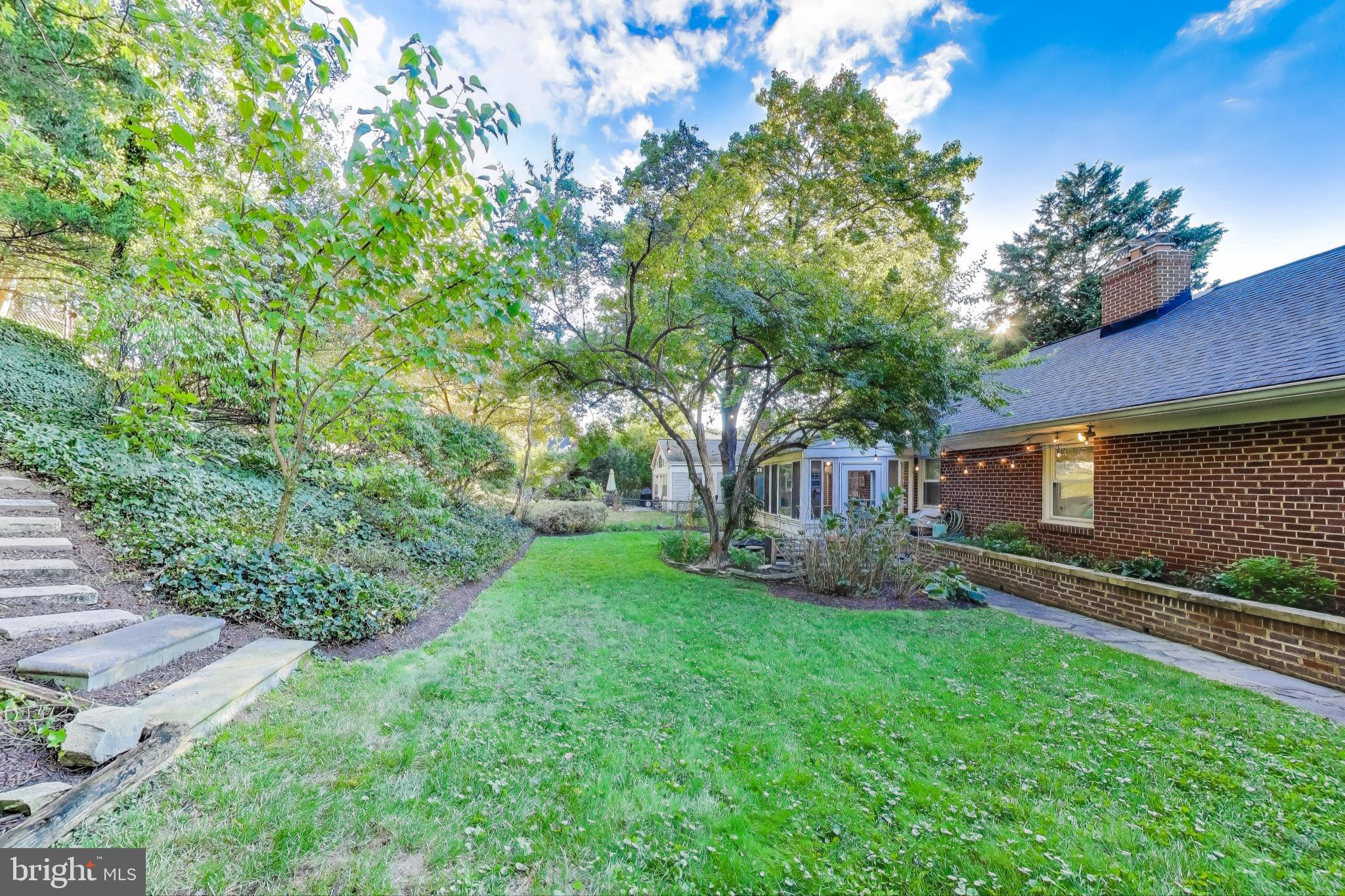 9613 Lorain Avenue Silver Spring, MD 20901 - Photo 39 of 40 a front view of a house with garden