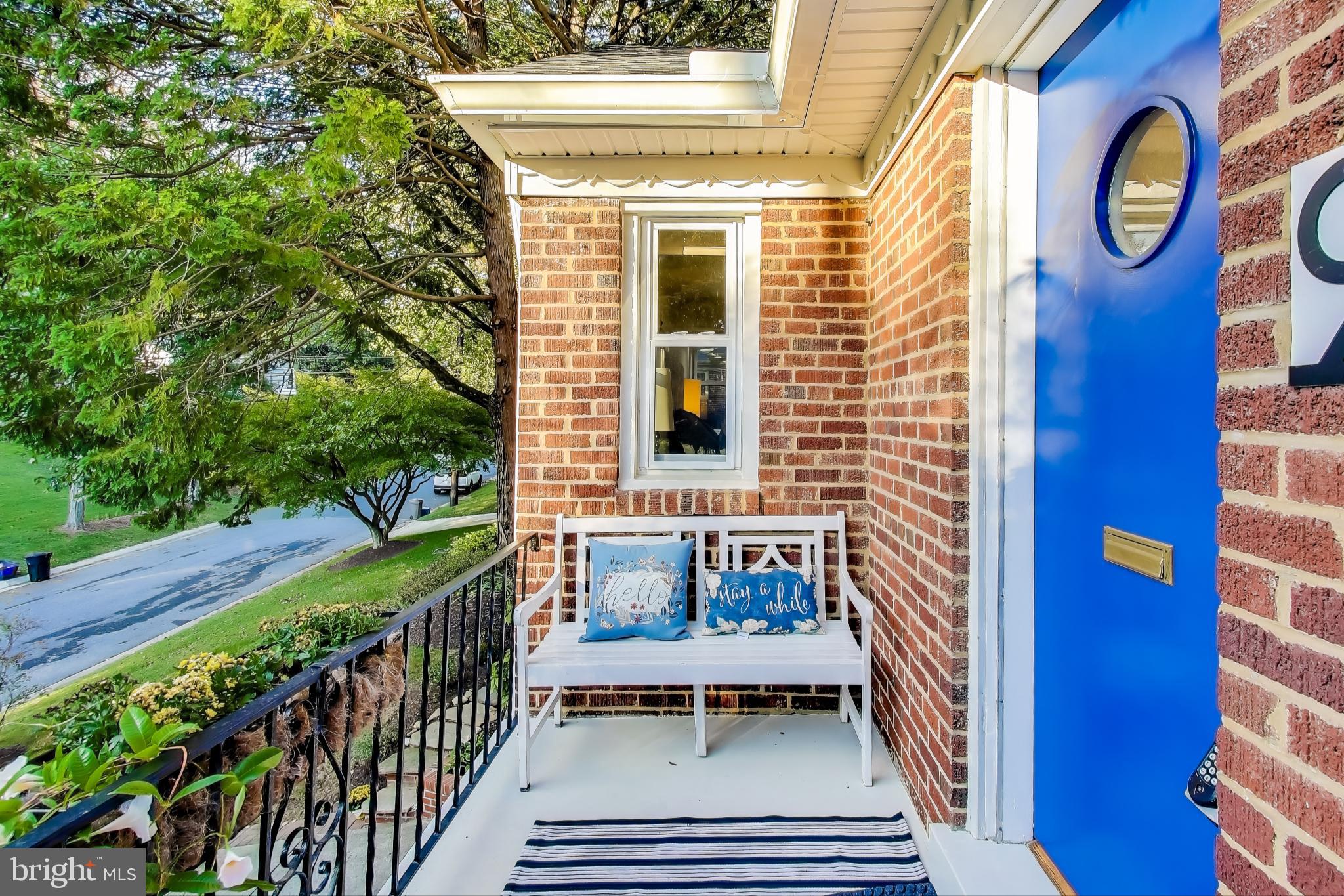 9613 Lorain Avenue Silver Spring, MD 20901 - Photo 5 of 40 a front view of a house with outdoor seating