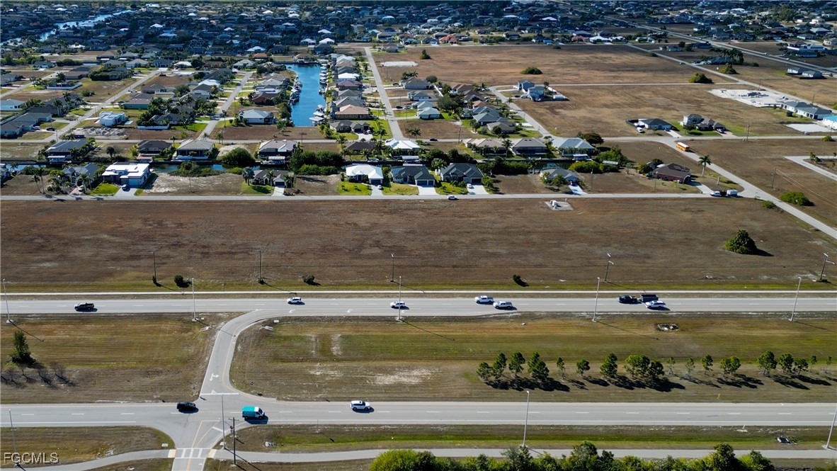 528-600 Burnt Store Road North Cape Coral, FL 33993 - Photo 14 of 16 an aerial view of a building with outdoor space