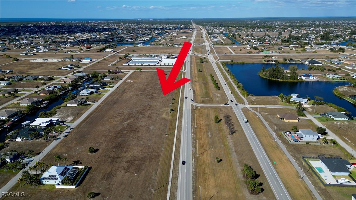 528-600 Burnt Store Road North Cape Coral, FL 33993 - Photo 3 of 16 an aerial view of a house with a ocean view