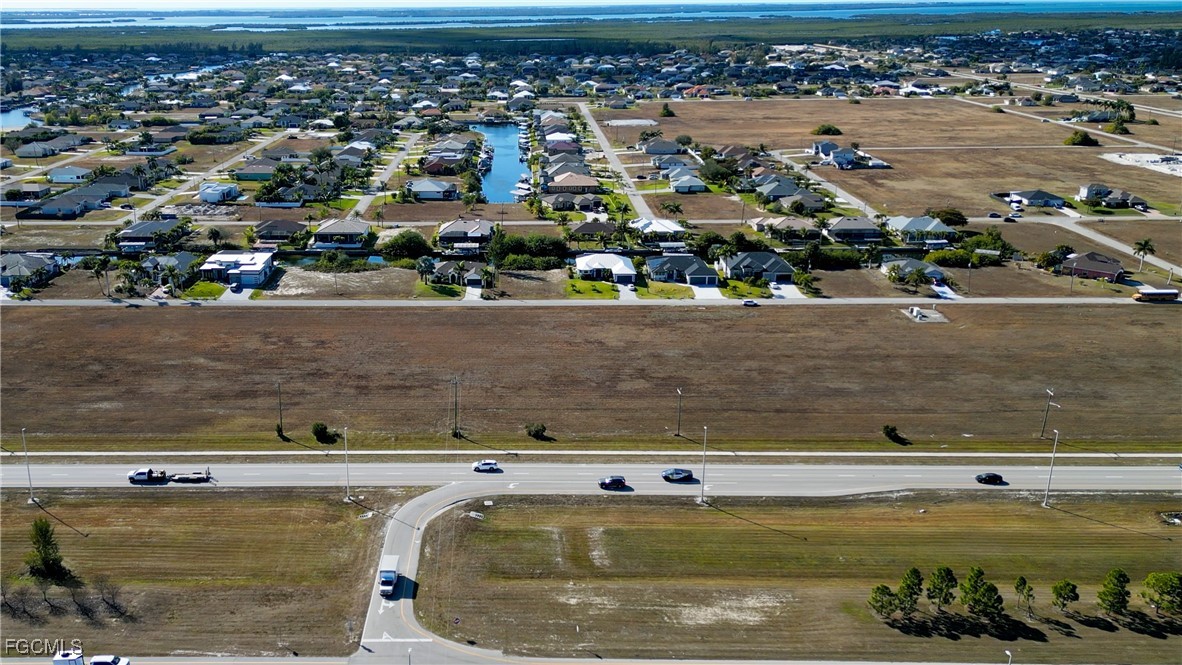 528-600 Burnt Store Road North Cape Coral, FL 33993 - Photo 6 of 16 an aerial view of a residential building with an ocean view