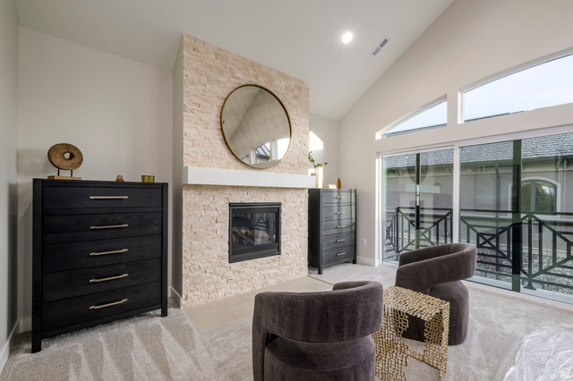 250 South Main Street, Unit 9 Alpine, UT 84004 - Photo 29 of 34 Sitting room with carpet floors, a fireplace, vaulted ceiling, and recessed lighting