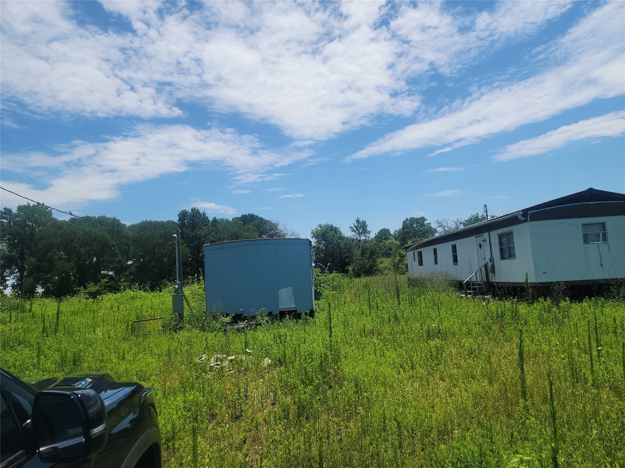 323 Summit Road Eagle Lake, TX 77434 - Photo 11 of 11 a view of a back yard