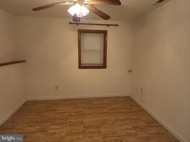 en empty room with a window