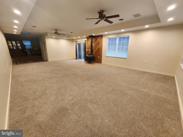 a view of a livingroom with furniture
