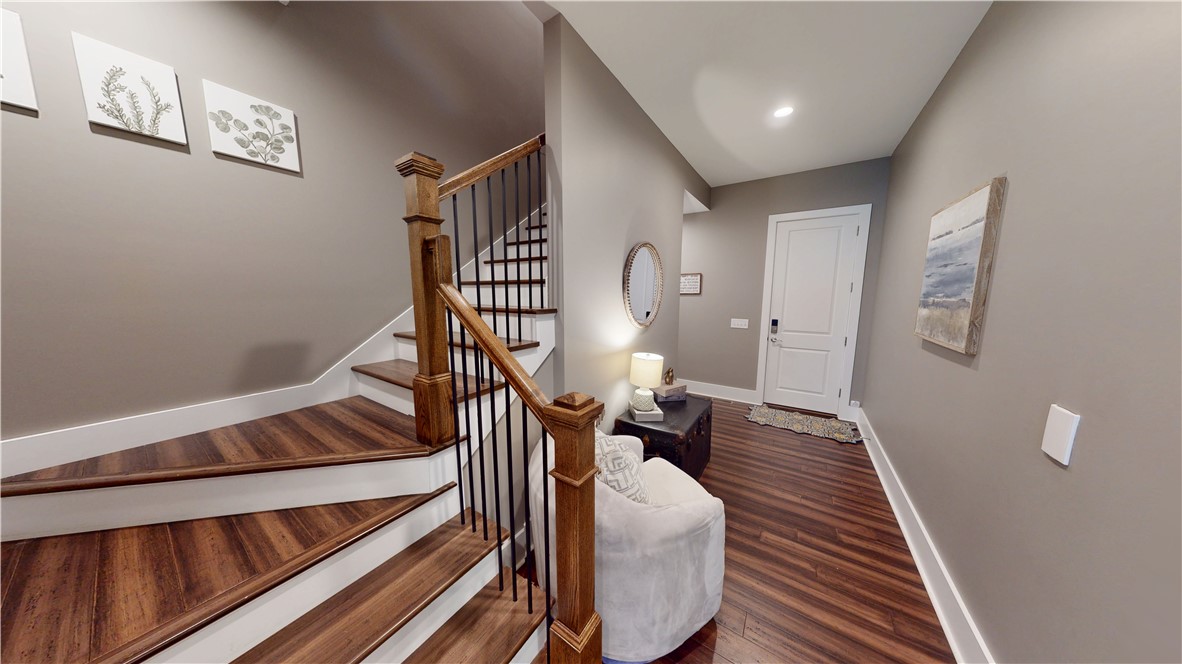 117 Shadowood Road Clemson, SC 29631 - Photo 23 of 45 Stairs leading up and hallway with guest half-bath