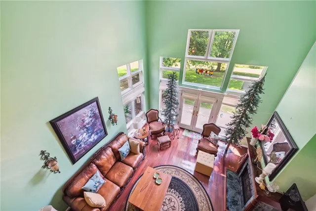 a kitchen with granite countertop a sink stove and cabinets