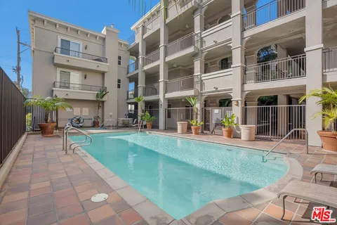 a view of a building with a patio