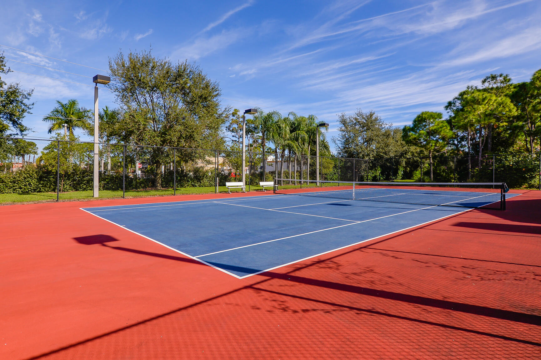 106 Southwest Peacock Boulevard, Unit 4204 Port St. Lucie, FL 34986 - Photo 34 of 46 a view of tennis court