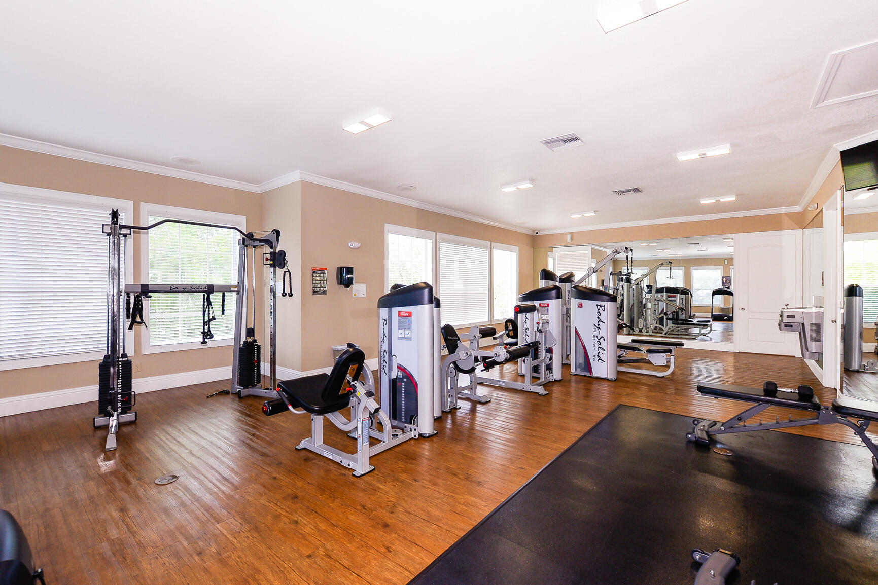 106 Southwest Peacock Boulevard, Unit 4204 Port St. Lucie, FL 34986 - Photo 41 of 46 a view of a room with gym equipment