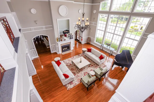 a living room with furniture and a table