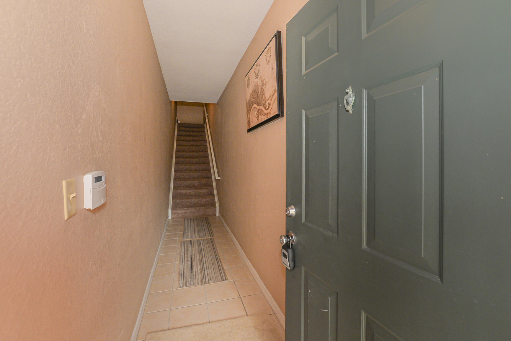 106 Southwest Peacock Boulevard, Unit 4204 Port St. Lucie, FL 34986 - Photo 6 of 46 a view of entryway