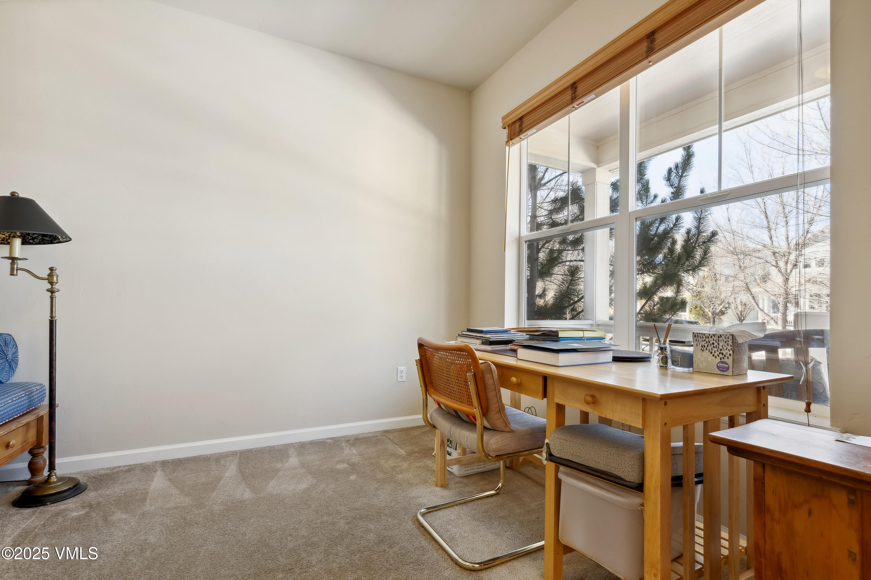 206 Mayer Street Eagle, CO 81631 - Photo 13 of 38 a view of a dining room with furniture and window