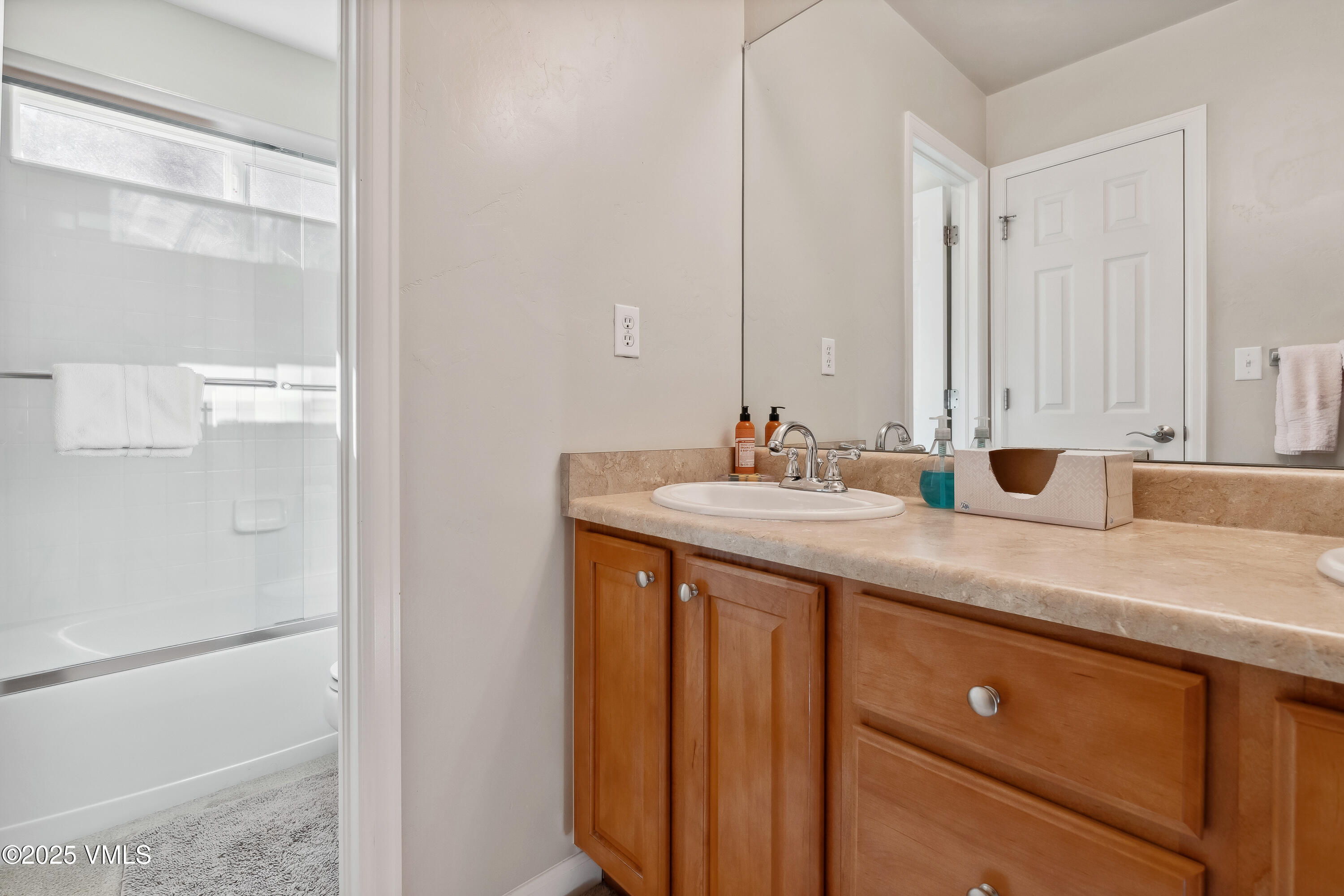 206 Mayer Street Eagle, CO 81631 - Photo 26 of 38 a bathroom with a sink and a mirror