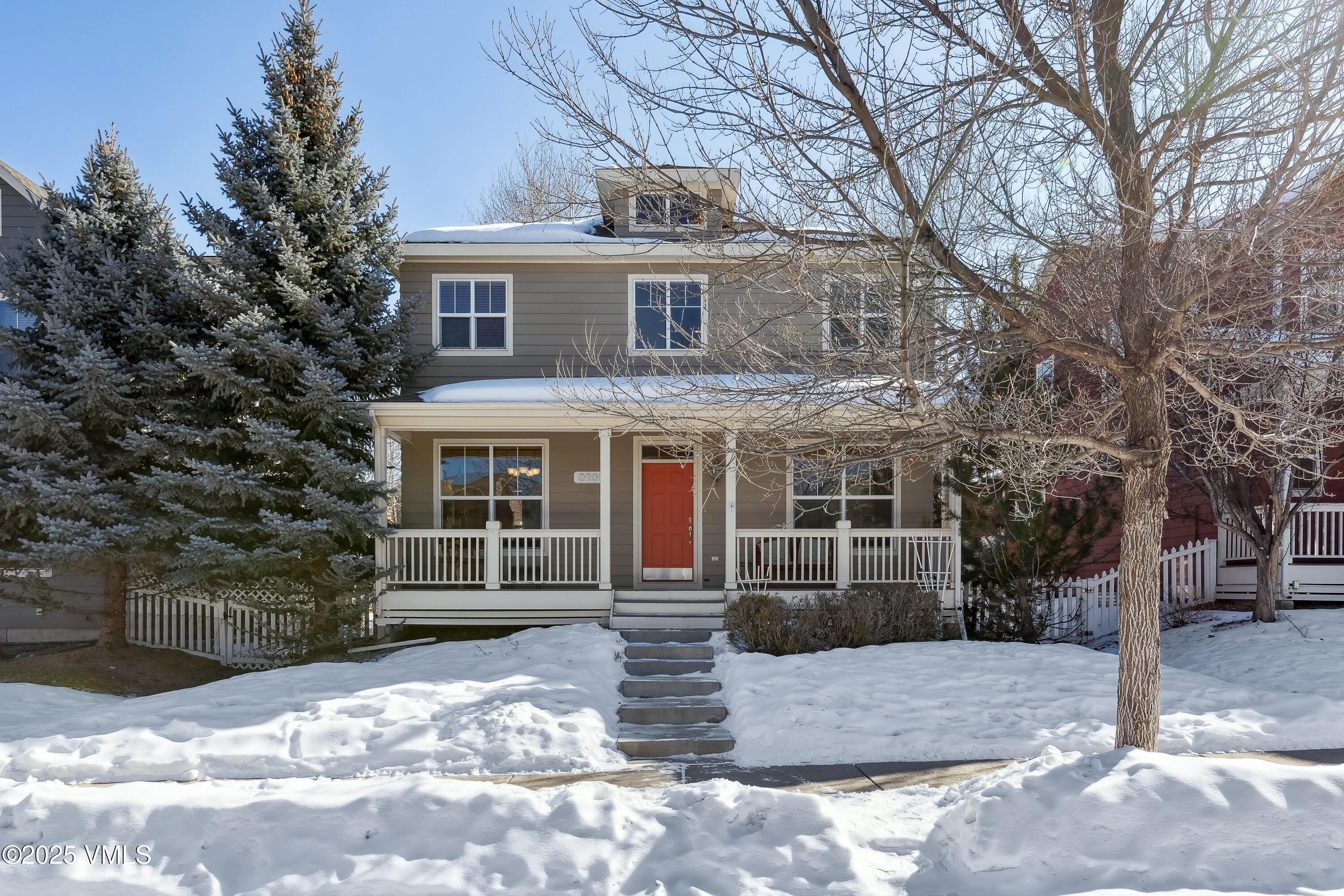 206 Mayer Street Eagle, CO 81631 - Photo 33 of 38 a front view of a house with a yard