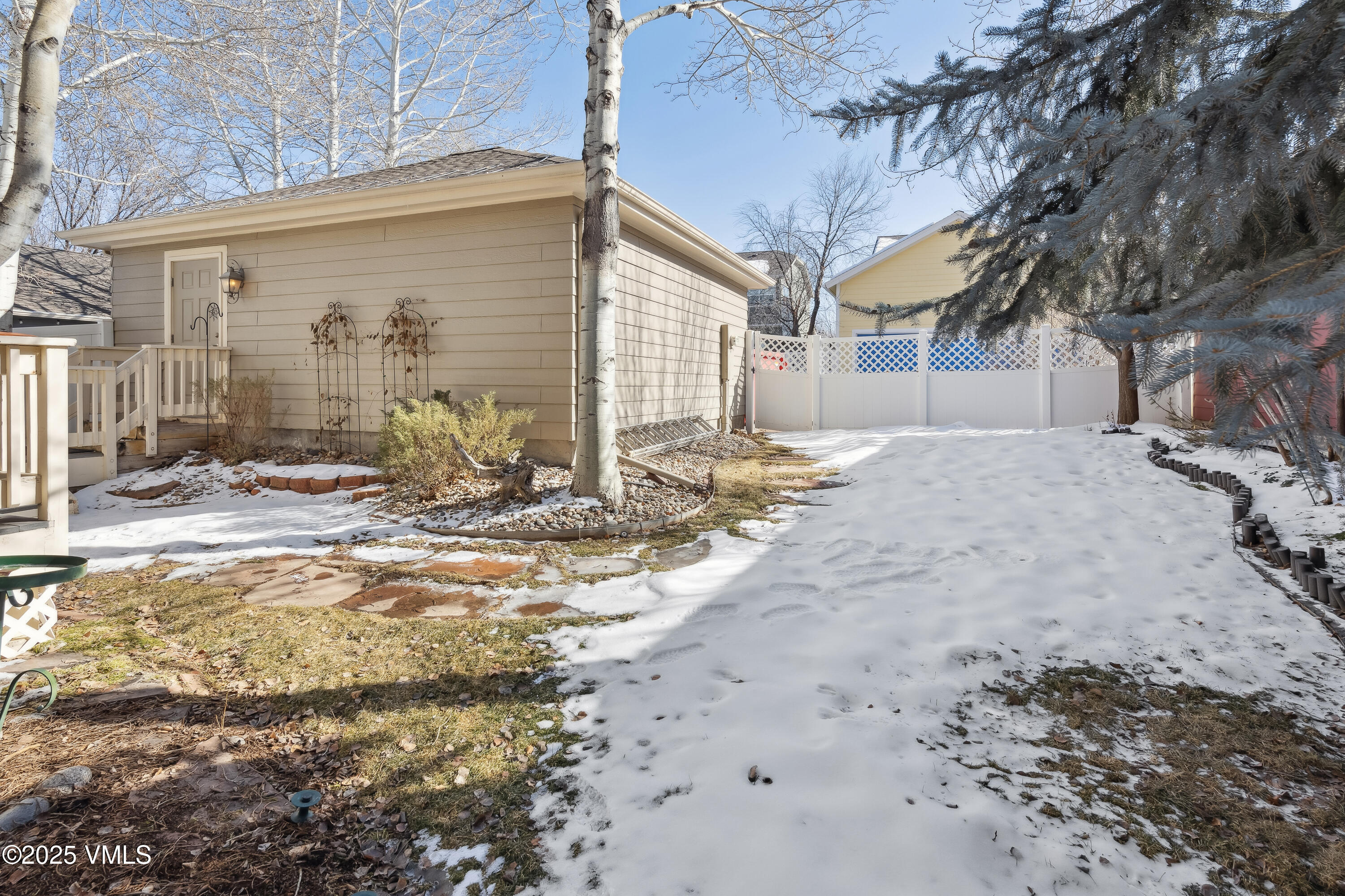 206 Mayer Street Eagle, CO 81631 - Photo 35 of 38 a view of a backyard with large tree