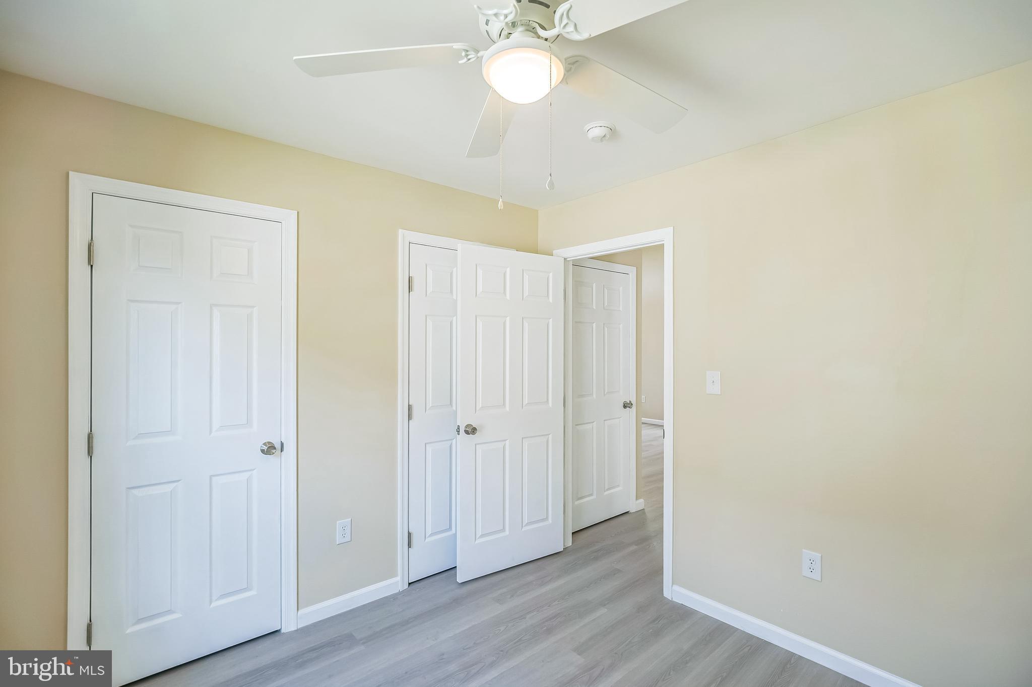 208 Hooker Street Riverside, NJ 08075 - Photo 15 of 25 a view of an empty room with wooden floor