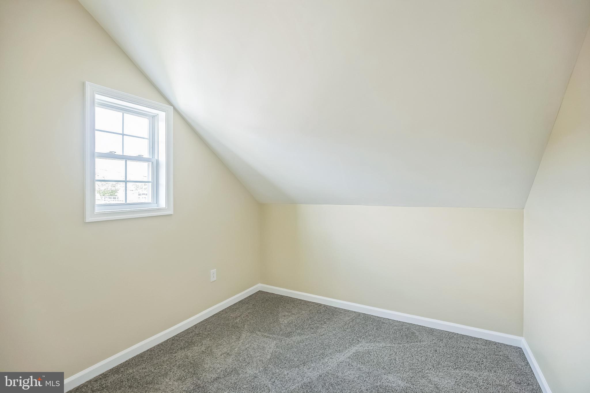 208 Hooker Street Riverside, NJ 08075 - Photo 21 of 25 an empty room with windows