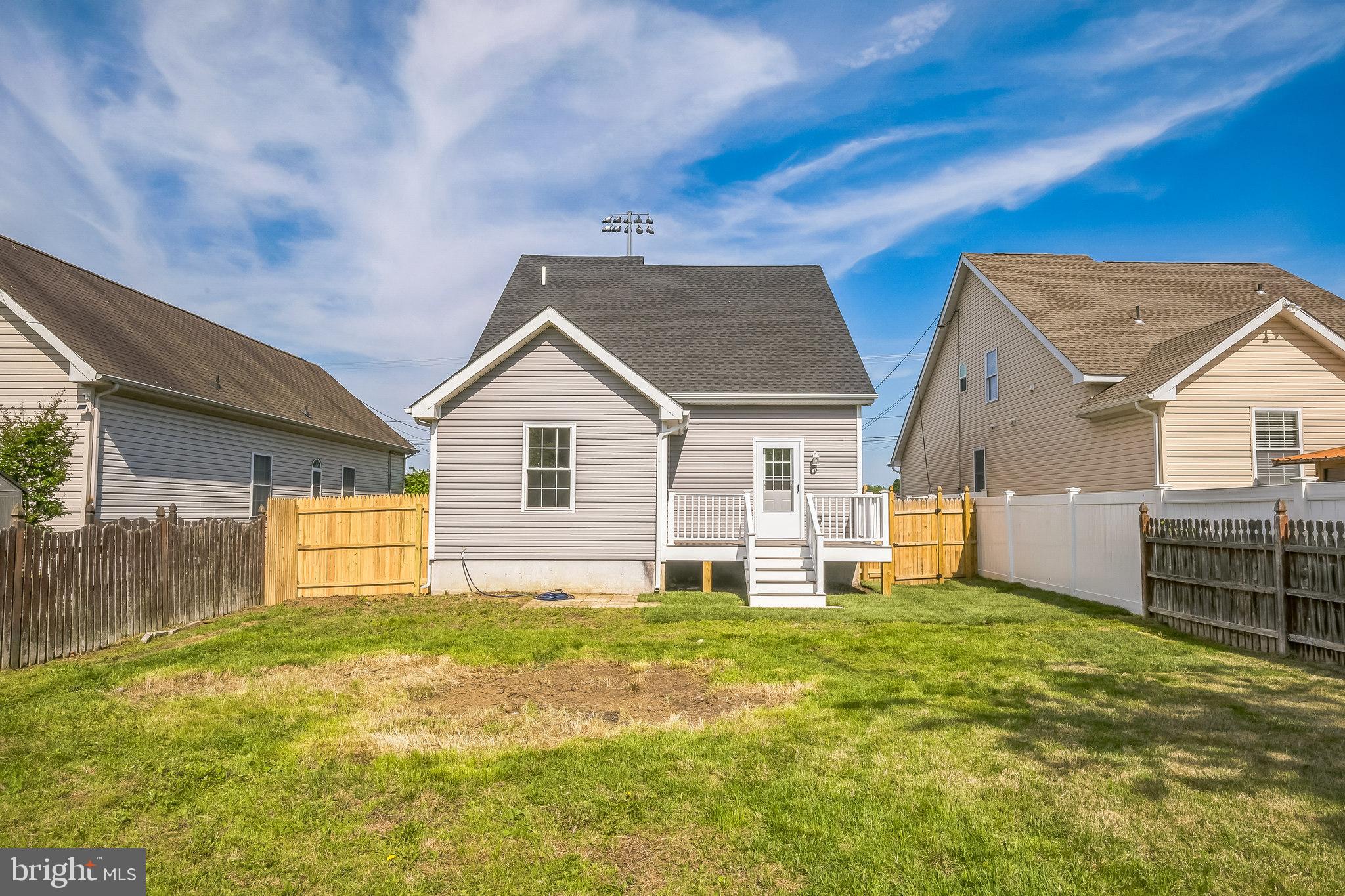 208 Hooker Street Riverside, NJ 08075 - Photo 24 of 25 a view of a house with a yard and garage