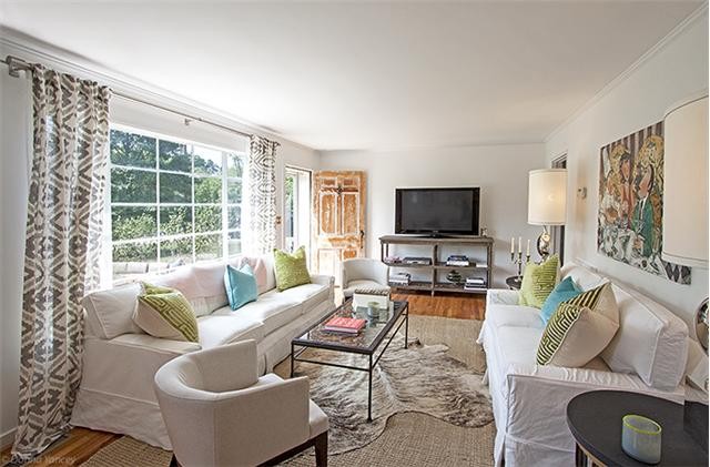 1714 Glen Echo Road Nashville, TN 37215 - Photo 11 of 12 a living room with furniture a flat screen tv and a large window