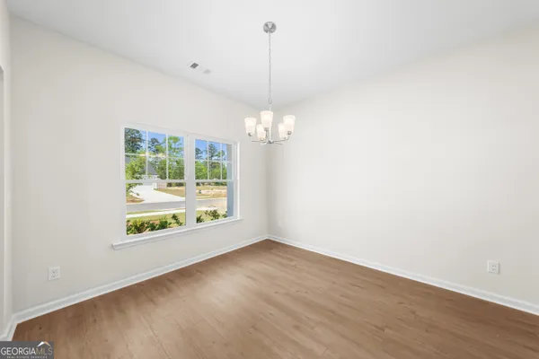 a view of an empty room with window