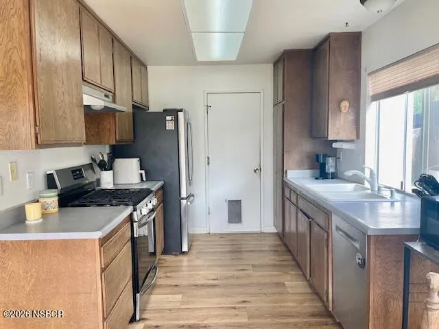 a view of a garden with an outdoor seating