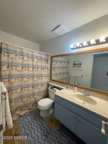 a view of a workspace with furniture