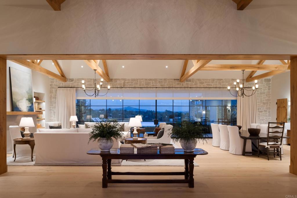 17845 Via De Fortuna Rancho Santa Fe, CA 92067 - Photo 3 of 45 a living room with furniture and a chandelier