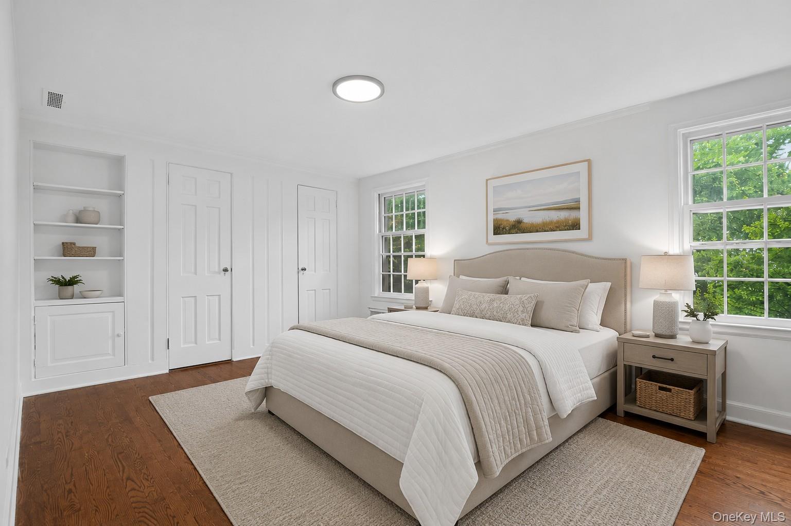 30 Pondview Road, Unit K Rye, NY 10580 - Photo 12 of 22 Bedrooms are on second level. Viurtually staged. Includes 2 closets, built-in shelves and steps to attic.
