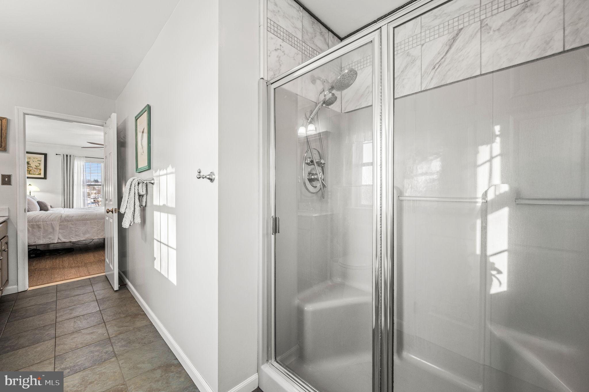 650 Willow Lane Atglen, PA 19310 - Photo 26 of 49 Modern bathroom with sleek glass shower.