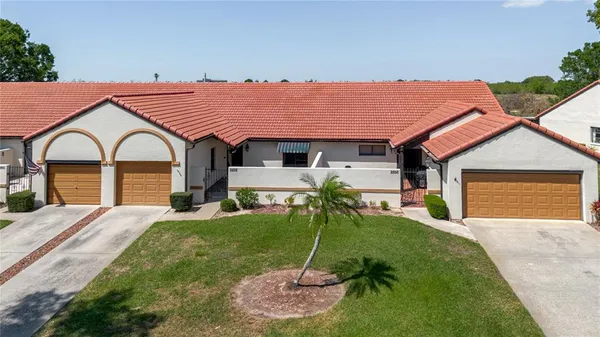 a house view with a garden space