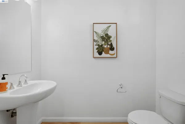 a bathroom with a toilet and sink