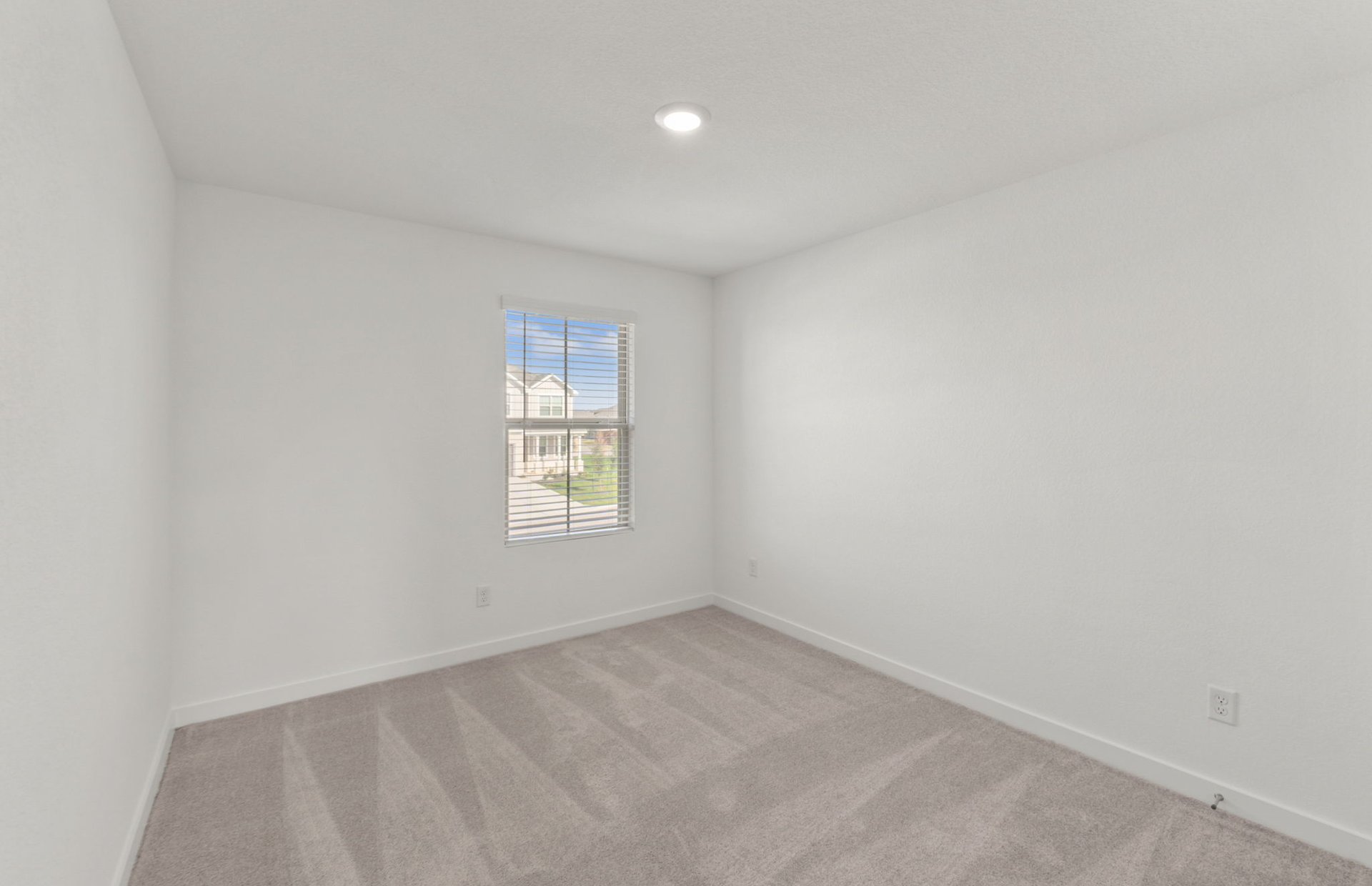 590 Rubber Tree Way Buda, TX 78610 - Photo 19 of 22 an empty room with a window