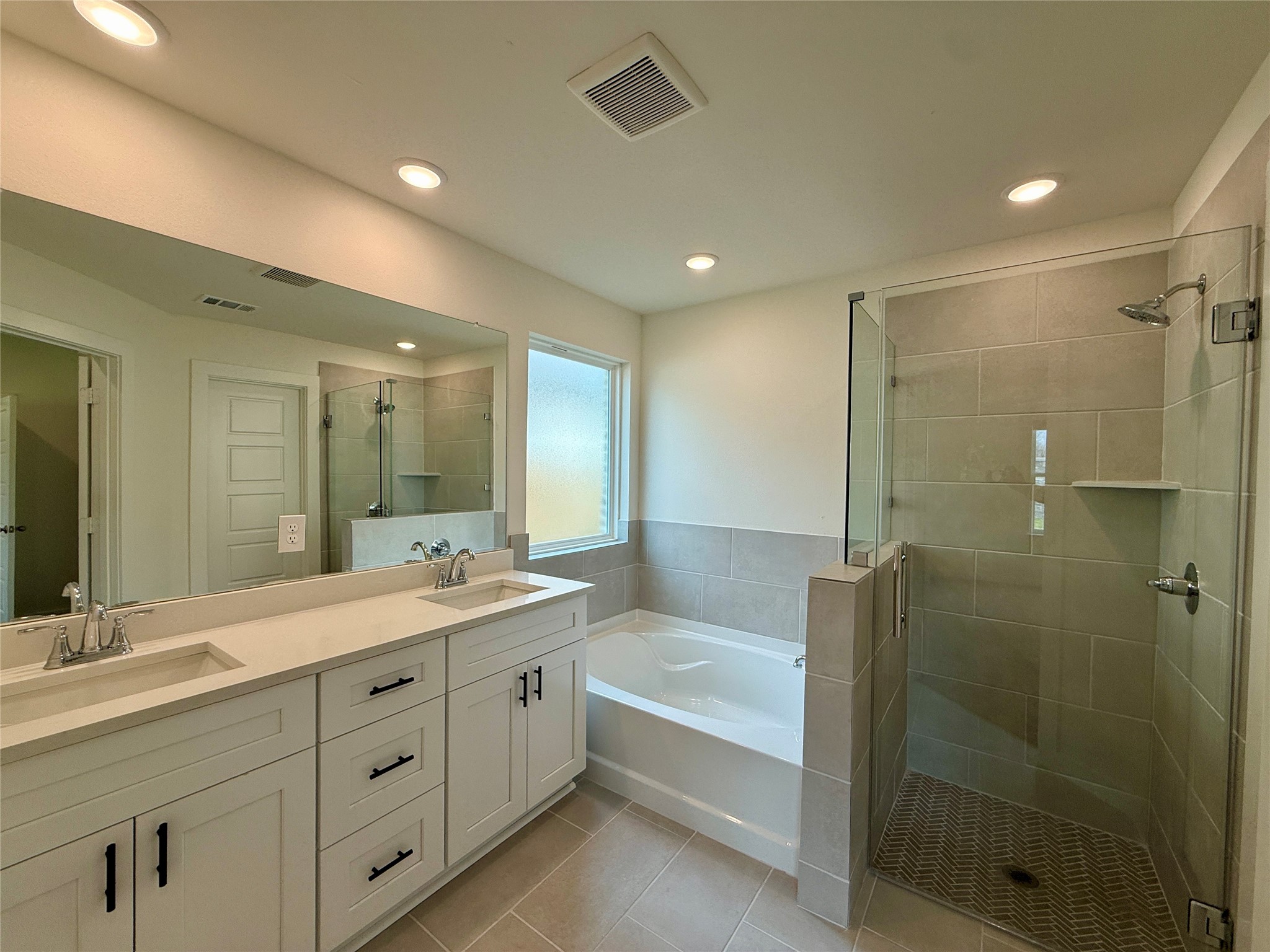 3218 Emerald Hills Drive Angleton, TX 77515 - Photo 7 of 7 a bathroom with a double vanity sink mirror double and shower