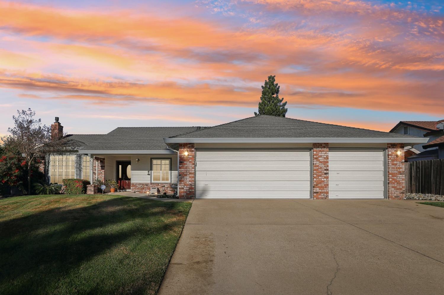 5834 Ford Road Rocklin, CA 95765 - Photo 1 of 1 a front view of a house with a yard and garage