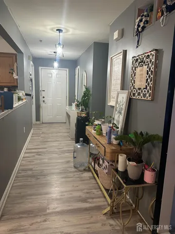 a room with furniture and wooden floor