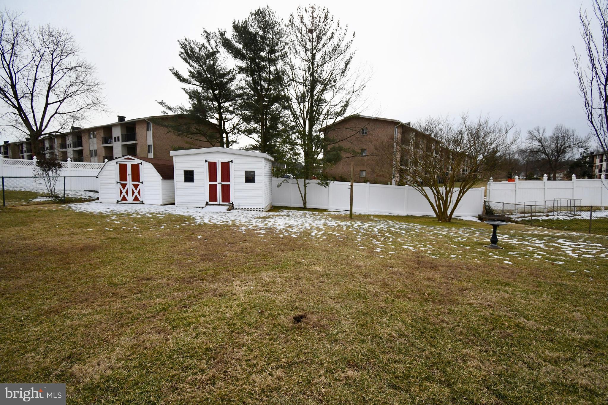 3707 Red Grove Road Baltimore, MD 21220 - Photo 26 of 32 a white house that has a tree in front of it