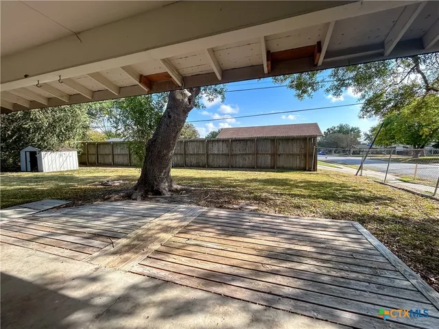 a view of a backyard of a house