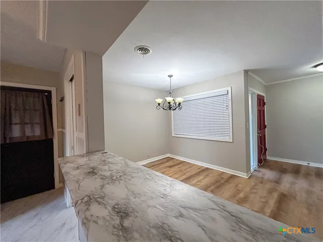 a view of a livingroom with a window